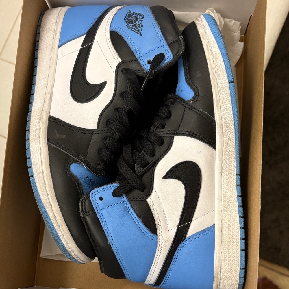 Nike Air Jordan 1 High OG in Black, White, and Blue